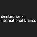 電通ジャパン・インターナショナルブランズ logo