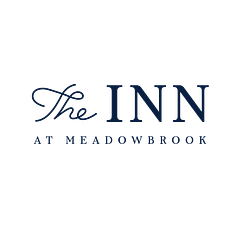 The Inn At Meadowbrook logo