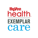 Exemplar Luxury Group logo
